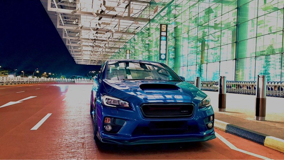 Subaru Impreza WRX 2.0 (A) (Category: Used Cars) located in Singapore. Submitted by chibab00m (Listing ID 1379411934, Image 1). Description: 2.01 turbocharged boxer engine, 264bhp, 8 speed CVT automatic with paddle shifters, AWD, ABS, airbags, cruise control, keyless entry/start/stop. Si drive mode select, multi function steering. Original seats. Leather upholstery, digital into meter, reverse camera, Sunroof. Most mods are Perrin parts, charge p