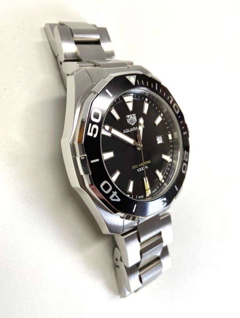 Tag Heuer Acuaracer WAY 101A.BA0746 (Category: Luxury Watches) located in Las Pinas. Submitted by jpntrader (Listing ID 1379512558, Image 2). Description: Tag Heuer Acuaracer WAY 101A.BA0746 Quartz 43mm with box, card,manual , extra link wrist 18cm Makinis.