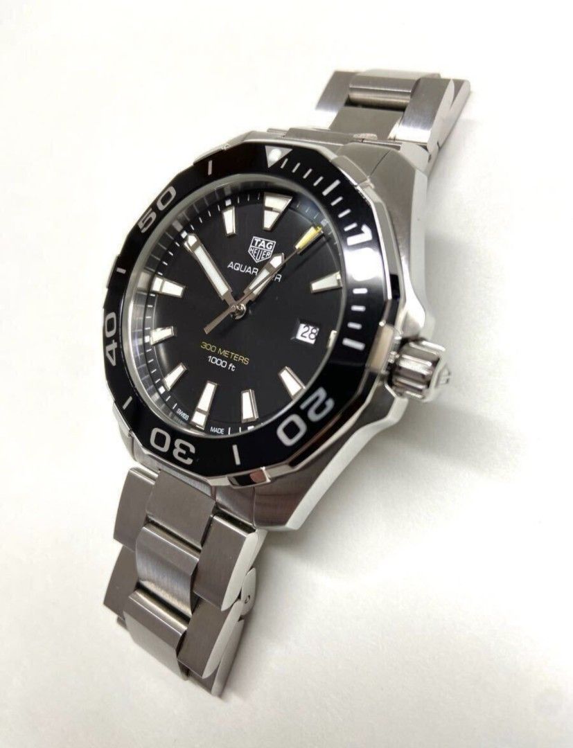 Tag Heuer Acuaracer WAY 101A.BA0746 (Category: Luxury Watches) located in Las Pinas. Submitted by jpntrader (Listing ID 1379512558, Image 3). Description: Tag Heuer Acuaracer WAY 101A.BA0746 Quartz 43mm with box, card,manual , extra link wrist 18cm Makinis.