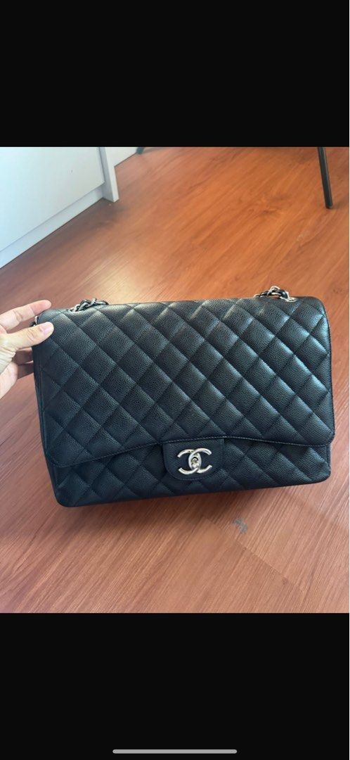 #14 Chanel Maxi Black Caviar SHW Double Flap (Category: Bags & Wallets) located in Singapore. Submitted by shahiddg (Listing ID 1379552625, Image 1). Description: Chanel Maxi CaviarSHW Double Flap 2011 (#14) Bag, Hologram,Dustbag Self collect or meet ups at tampines area or after office to flora drive authentic 100%.