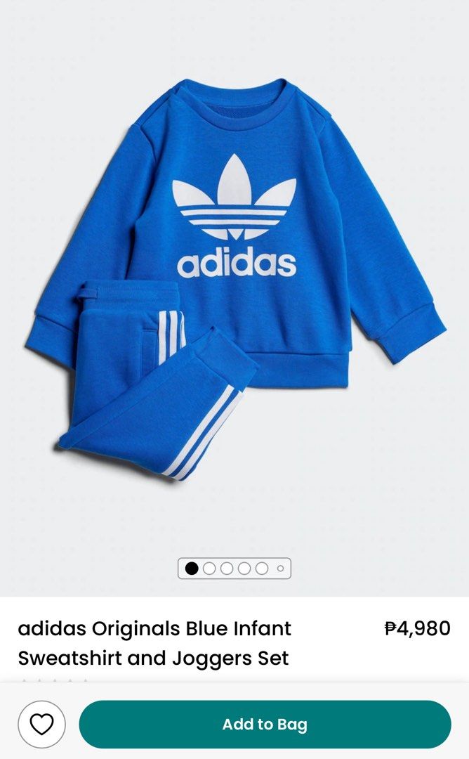 Adidas Blue Logo Jogger Set (Category: Babies & Kids Fashion) located in Marikina City. Submitted by caseykace (Listing ID 1379542786, Image 1). Description: Like New used once for his milestone pic but hated anything with long sleeves so it was worn for literally 10mins. Washed with baby safe cleanser and kept in a clean place. Size is 9-12months RFS: Out grown immediately Bought at Adidas for 4,980 selling half off Pick up in Marikina at my hou
