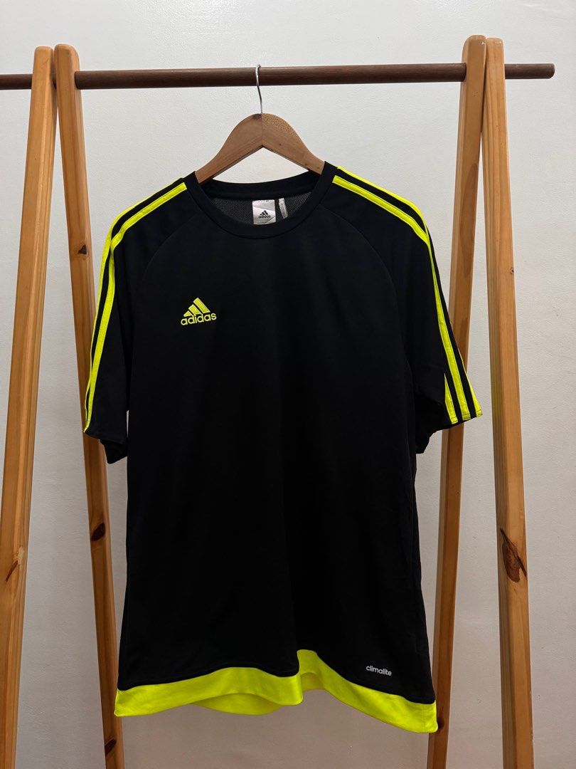 Adidas Climalite Sports Tee (Category: Activewear) located in Makati City. Submitted by thiftdirection (Listing ID 1379659268, Image 1). Description: Adidas Climalite Sports Tee Level up your game with this black Adidas performance shirt featuring neon yellow stripes and logo for that bold, athletic edge. Lightweight, breathable, and made with Climalite fabric to keep you cool and dry during every move. Perfect for training, running, or daily act