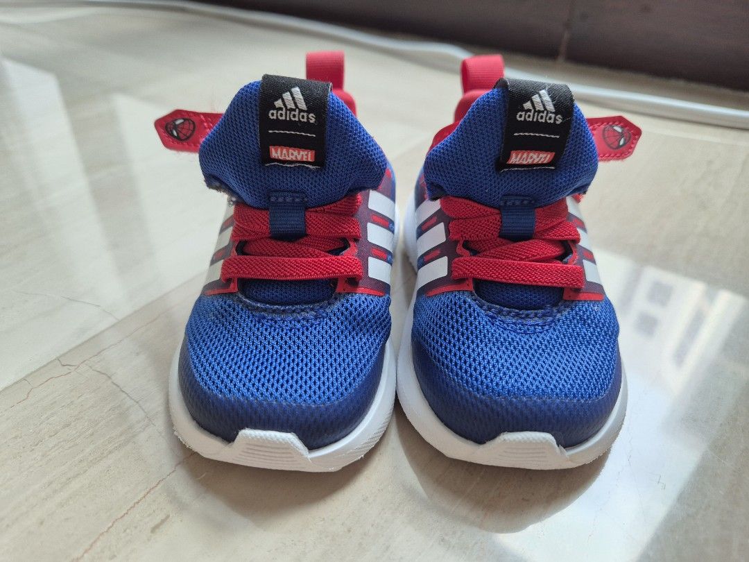 Adidas Marvel Toddler Shoes (Category: Babies & Kids Fashion) located in Singapore. Submitted by shallowdreamx (Listing ID 1379579684, Image 2). Description: - Adidas toddler shoes - Blue and red color scheme - Features Marvel logo - Classic Adidas stripes Like new, baby wore once and it was too tight for him - Minimal sole wear.