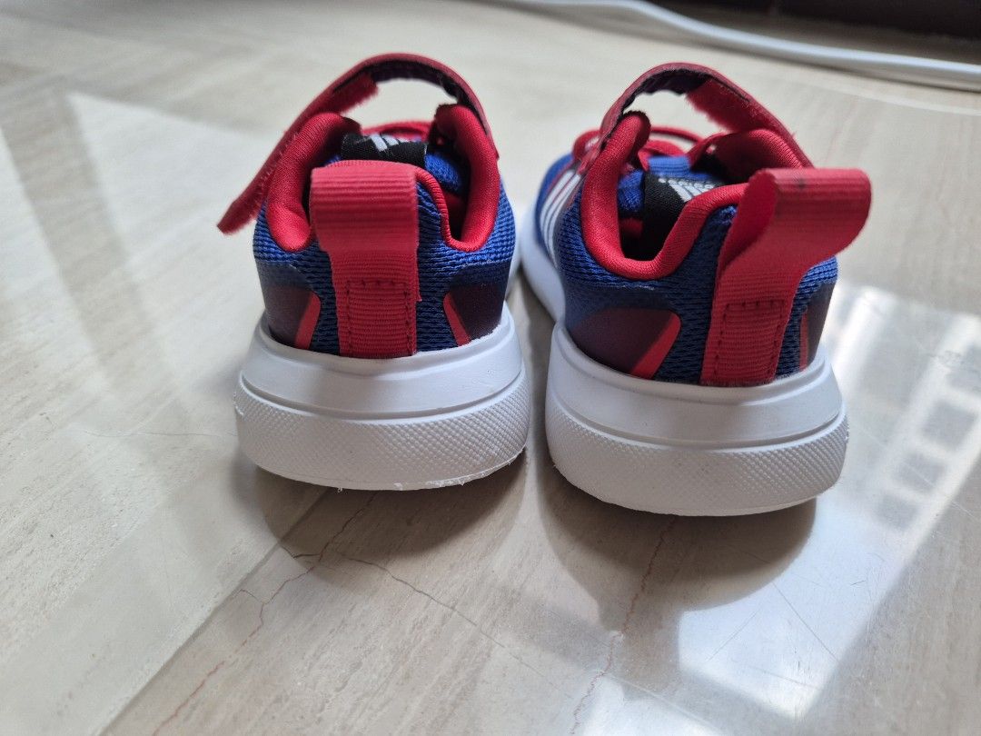 Adidas Marvel Toddler Shoes (Category: Babies & Kids Fashion) located in Singapore. Submitted by shallowdreamx (Listing ID 1379579684, Image 3). Description: - Adidas toddler shoes - Blue and red color scheme - Features Marvel logo - Classic Adidas stripes Like new, baby wore once and it was too tight for him - Minimal sole wear.