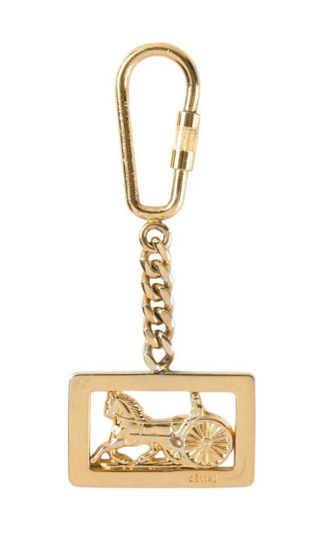 Authentic CELINE Key Ring "Horse-Drawn Carriage" (Category: Luxury Accessories) located in Rosario. Submitted by myvinatgepieces (Listing ID 1379673412, Image 1). Description: Authentic CELINE Key Ring "Horse-Drawn Carriage" Brand New Condition Signature Stunning Piece Perfect for your bag or add it to your keys No Inclusions 2850 each 6500 bundle of 3.