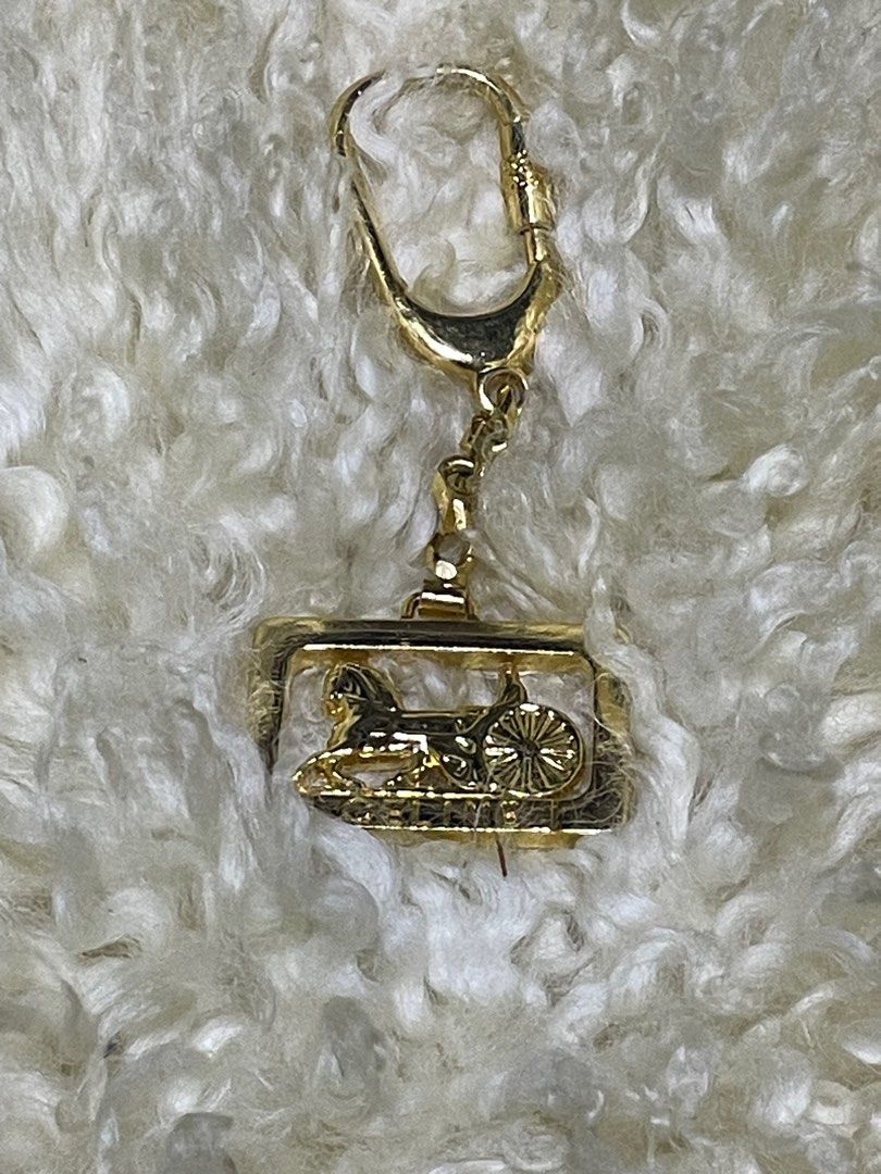 Authentic CELINE Key Ring "Horse-Drawn Carriage" (Category: Luxury Accessories) located in Rosario. Submitted by myvinatgepieces (Listing ID 1379673412, Image 2). Description: Authentic CELINE Key Ring "Horse-Drawn Carriage" Brand New Condition Signature Stunning Piece Perfect for your bag or add it to your keys No Inclusions 2850 each 6500 bundle of 3.