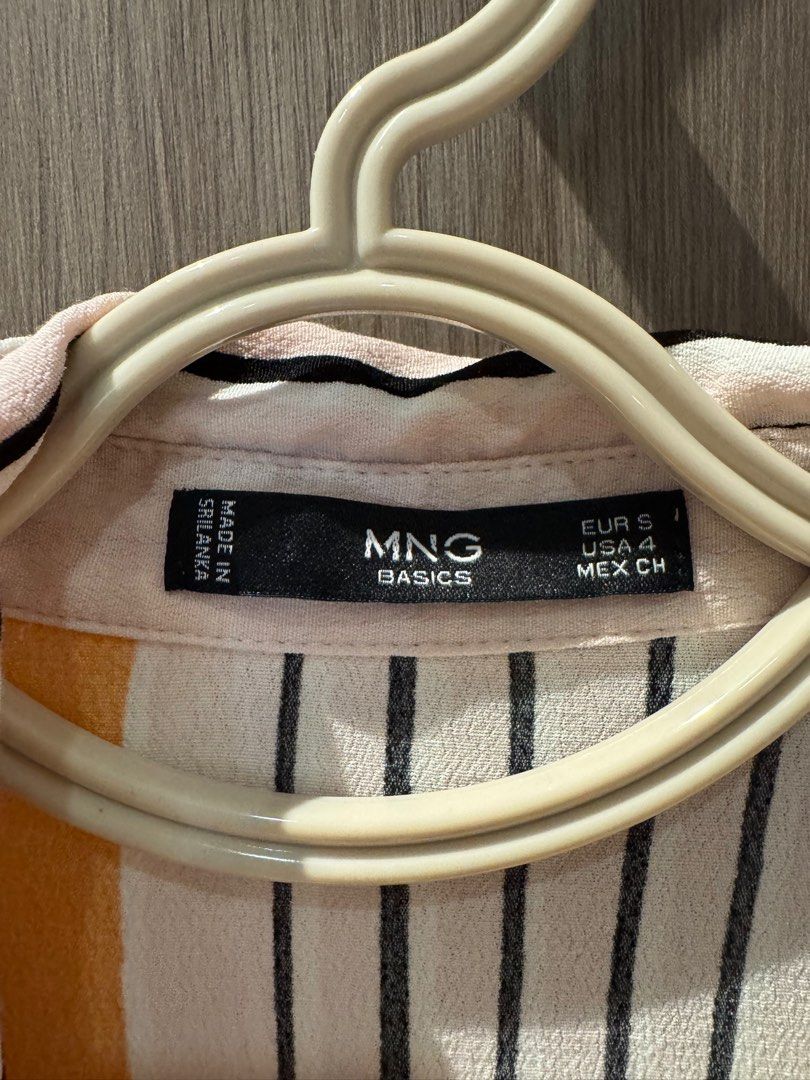 *AUTHENTIC* Mango Orange White Stripes Button Down Muscle Sleeves Size S (Category: Blouses) located in Bacolod City. Submitted by leanjean (Listing ID 1379718972, Image 2). Description: *AUTHENTIC* Mango Orange White Stripes Button Down Muscle Sleeves Size S Decluttering. No longer using. Pls add 150 for sf from Bacolod..