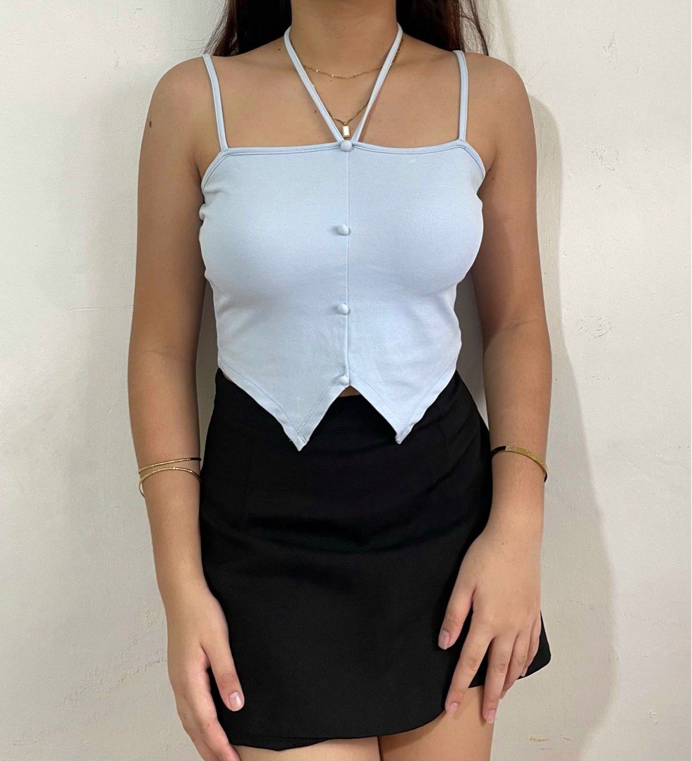 baby blue tie crop top (Category: Sleeveless) located in Quezon City. Submitted by titapple (Listing ID 1379642106, Image 1). Description: baby blue tie top, stretchy fabric, size xs-m, no flaws L: 16”” from straps W: 14” (measuring tape laid flat).