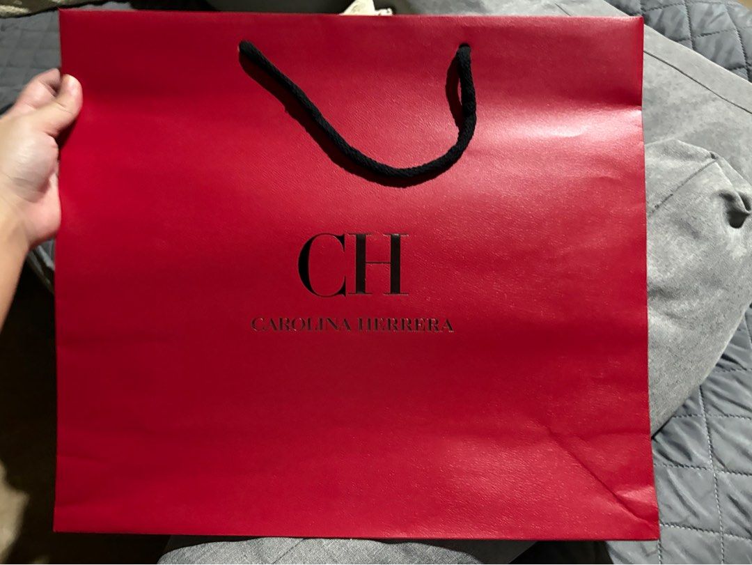 CAROLINA HERRERA BIG PAPERBAG (Category: Luxury Bags & Wallets) located in Las Pinas. Submitted by cc.decluttering (Listing ID 1379685449, Image 1). Description: 5pcs available.