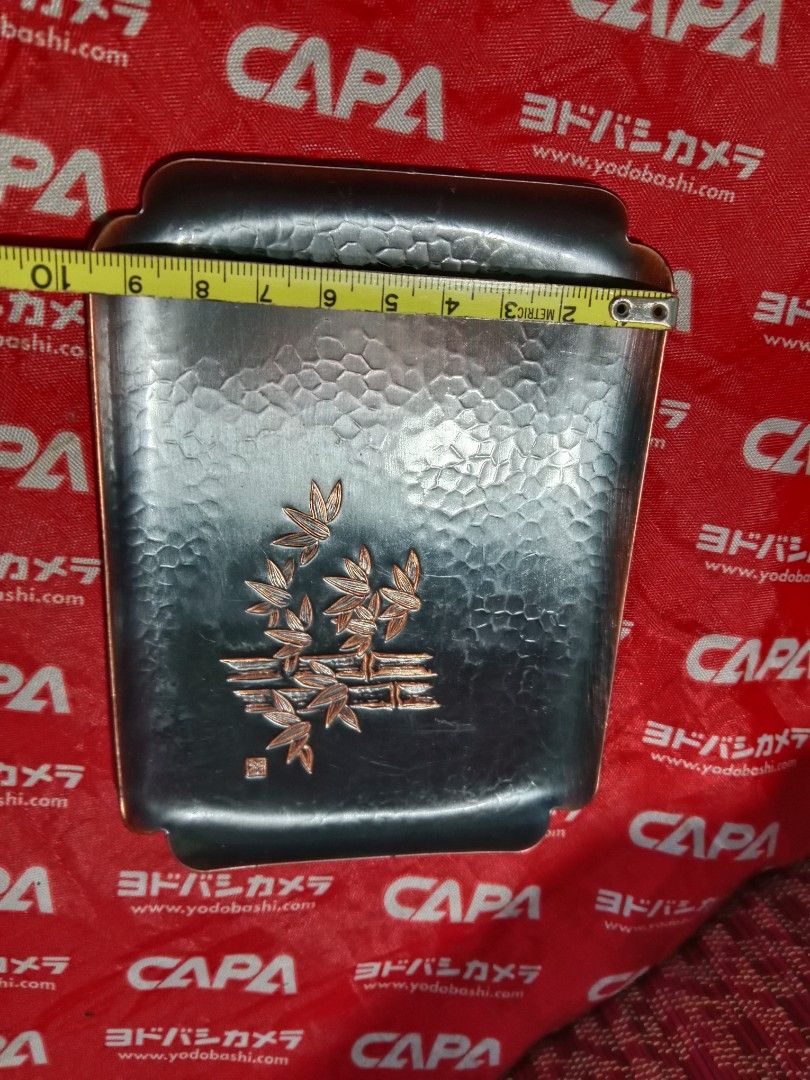 Copper "MEIMEIZARA" ( side plate / individual serving plate) (Category: Dinnerware & Cutlery) located in Tabaco. Submitted by fritznicoleshoppe (Listing ID 1379716192, Image 3). Description: Copper "MEIMEIZARA" ( side plate / individual serving plate). Good as new. embossed or etched design. One of the " five gentlemen" in East Asian Art" collectible item.