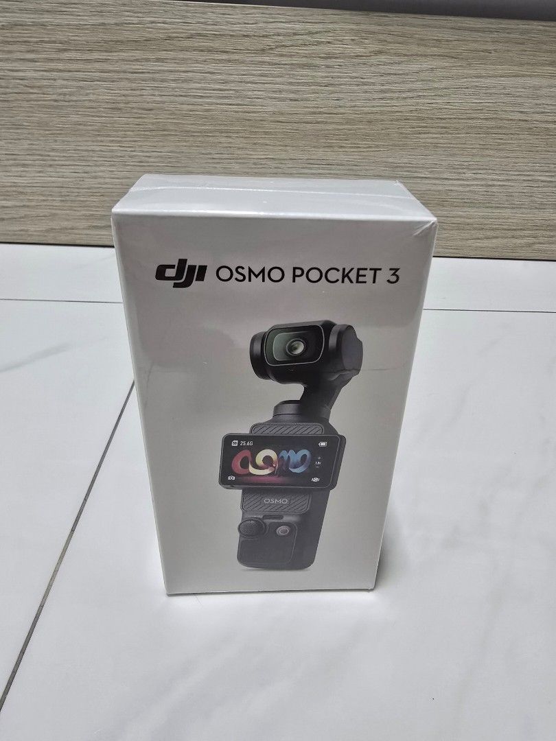 DJI Osmo Pocket 3 (Category: Video Cameras) located in Singapore. Submitted by Voovoo (Listing ID 1379695698, Image 2). Description: Selling a complete DJI Osmo Pocket 3 accessories bundle. Includes: 1. SEALED Osmo Pocket 3 Standard edition 2. DJI Mic Mini set + Silicone cover 3. Neewer 6 Pack filter (CPL, UV, ND 16, ND32, ND64, ND256) 4. Neewer 1/8 black mist filter 5. SanDisk Extreme Pro 512GB SD card 6. STARTRC protective case (carry 3 extra f