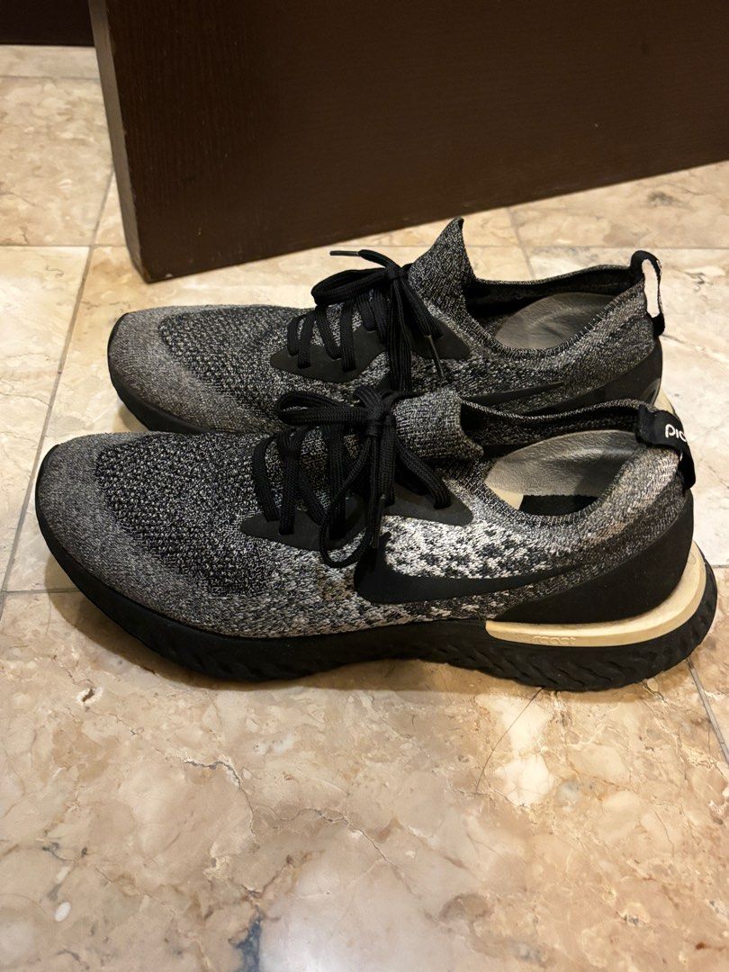 Epic React Size 9.5 (Category: Sneakers) located in Manila. Submitted by aceford88 (Listing ID 1379707470, Image 1). Description: Reglued. Still in ok condition. .