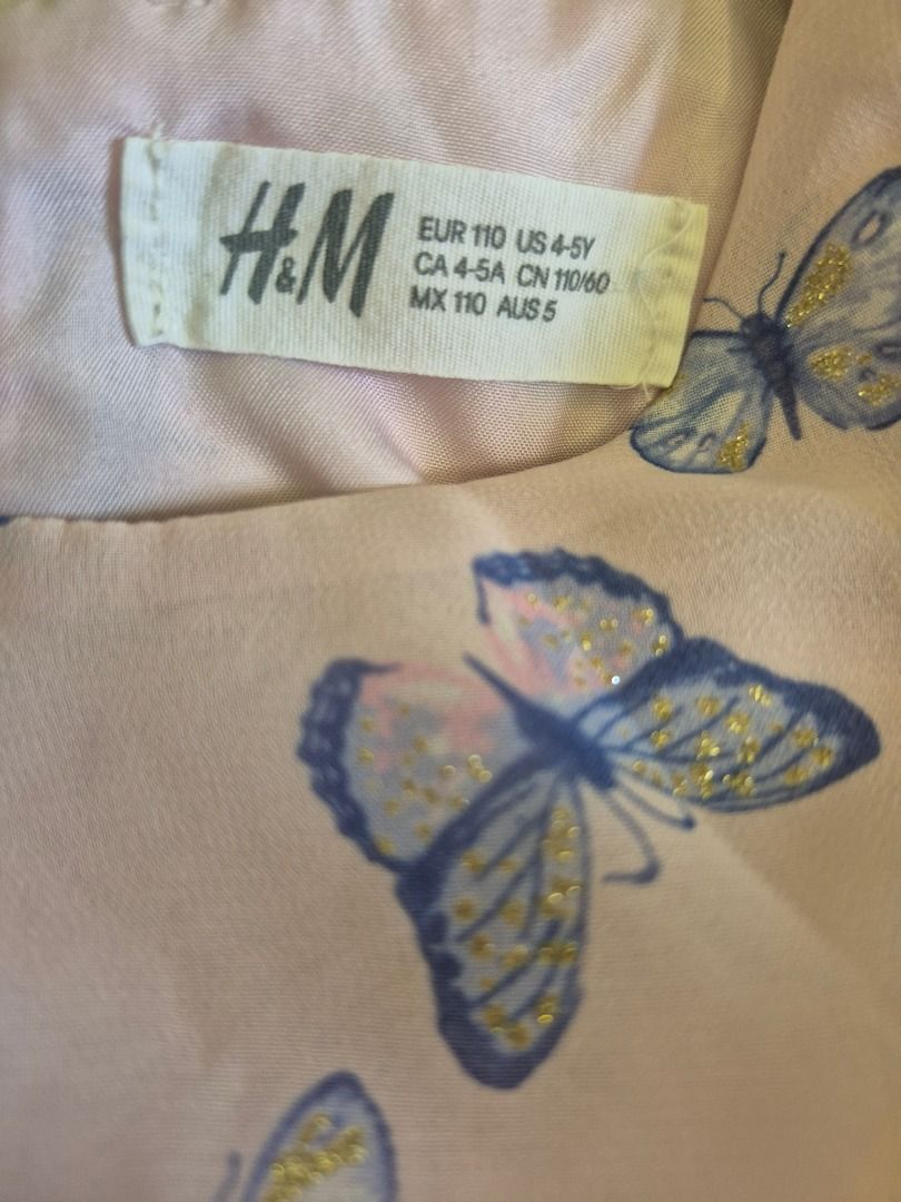 H&M Butterfly Print Dress - Size 4-5Y (Category: Babies & Kids Fashion) located in Singapore. Submitted by seasoninlife (Listing ID 1379562273, Image 3). Description: Adorable H&M dress featuring a lovely butterfly print, size 110. The dress has a comfortable fit with a gathered waist and flutter sleeves. Perfect for a little girl's wardrobe. In excellent condition, ready to wear!.