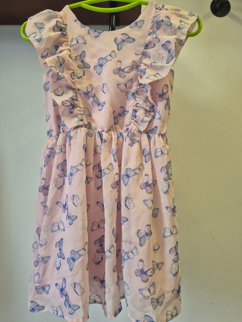 H&M Butterfly Print Dress - Size 4-5Y (Category: Babies & Kids Fashion) located in Singapore. Submitted by seasoninlife (Listing ID 1379562273, Image 1). Description: Adorable H&M dress featuring a lovely butterfly print, size 110. The dress has a comfortable fit with a gathered waist and flutter sleeves. Perfect for a little girl's wardrobe. In excellent condition, ready to wear!.