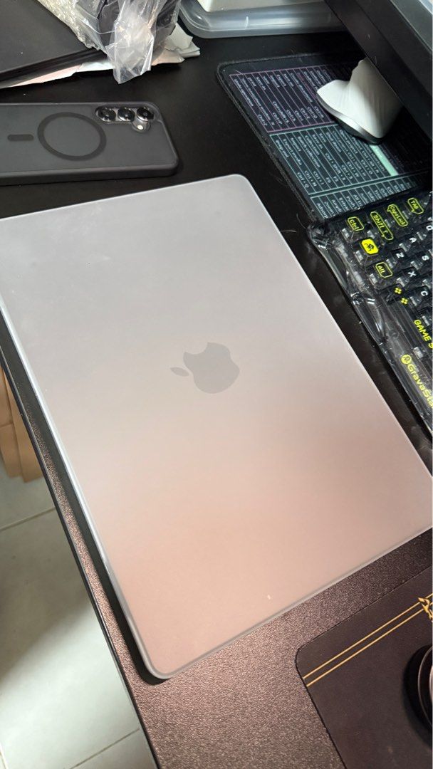 MacBook Pro 14.2" HardShell Case (Category: Laptop Bags & Sleeves) located in Singapore. Submitted by nov23rd (Listing ID 1379660965, Image 2). Description: Like new hard shell case for MacBook Pro 14.2". Provides protection for your laptop. The case is matt white and slightly see thru. Easy to install and remove. Suits all MacBook Pro 14 apparently (mine is 2024); it has ventilation slots below for older MacBook Pros. Selling cos I prefer a clea
