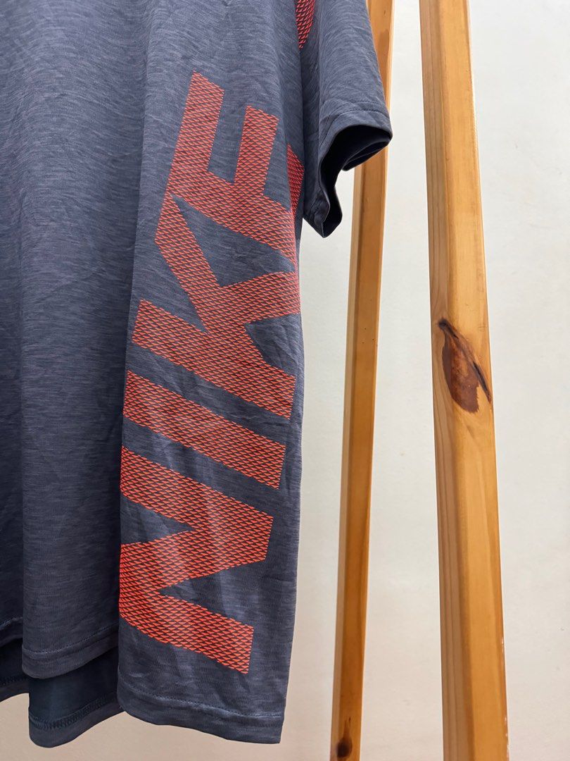 NIKE Dri-FIT Performance Tee (Category: Tshirts & Polo Shirts ) located in Makati City. Submitted by thiftdirection (Listing ID 1379646766, Image 3). Description: NIKE Dri-FIT Performance Tee ✨ Stay cool, dry, and stylish in this lightweight gray Nike shirt with bold red branding. Perfect for workouts or casual days out! XXL on Tag Actual Dimes 28x22 excellent condition with complete wash tag 650.00 📍DM to grab it now! Thriftdirection.ph is not 