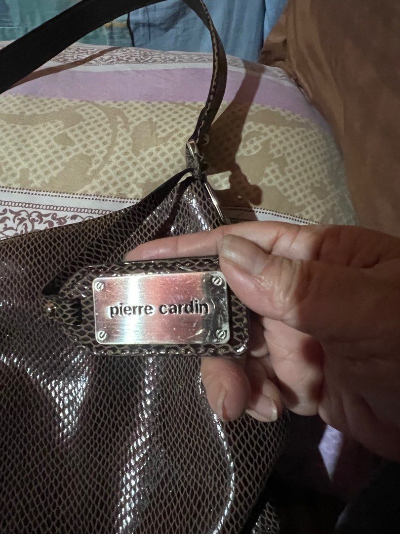Piere Cardin authentic (Category: Luxury Bags & Wallets) located in Makati City. Submitted by sinner_or_saint101 (Listing ID 1379602193, Image 3). Description: 15x 11 x 6 Crocodile skin Like new Authentic piere cardin Hobo.