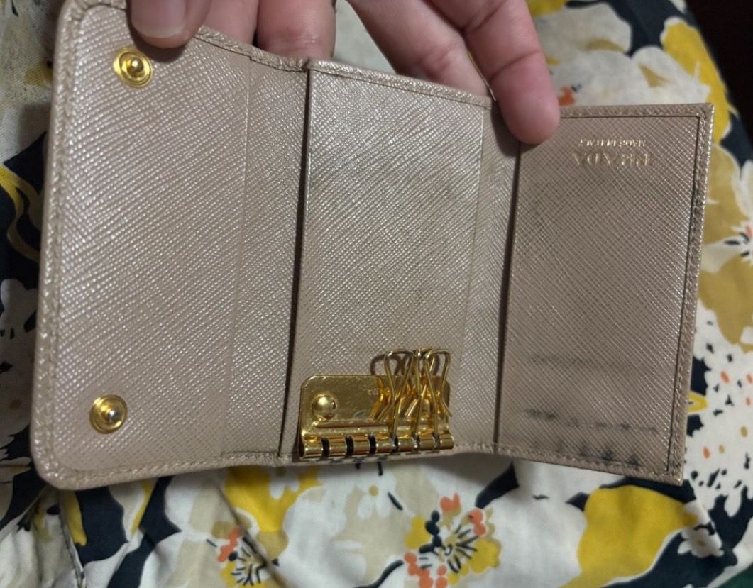 Prada key holder (Category: Luxury Bags & Wallets) located in Caloocan City. Submitted by paulabee8493739 (Listing ID 1379687609, Image 2). Description: Authentic Prada key holder. No scuffing, only some parts has discoloration..