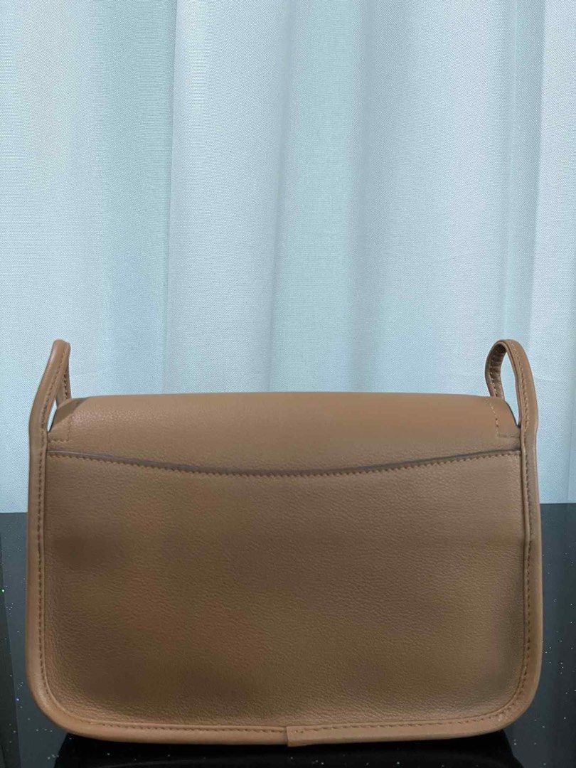 Prada leather sling (Category: Luxury Bags & Wallets) located in Quezon City. Submitted by rarebagsfrmjapan (Listing ID 1379707917, Image 2). Description: PERFECT GIFT OR GIVEAWAYS REWARD UR SELF OR LOVE ONES AT LEAST ONCE A YEAR !!! 𝐃𝐈𝐒𝐂𝐋𝐀𝐈𝐌𝐄𝐑: we are 𝐧𝐨𝐭 𝐚𝐬𝐬𝐨𝐜𝐢𝐚𝐭𝐞𝐝 𝐰𝐢𝐭𝐡 𝐭𝐡𝐞 𝐛𝐫𝐚𝐧𝐝𝐬 𝐭𝐡𝐚𝐭 𝐚𝐫𝐞 𝐥𝐢𝐧𝐤𝐞𝐝 𝐚𝐧𝐝 𝐬𝐭𝐚𝐭𝐞𝐝 𝐢𝐧 𝐭𝐡𝐢𝐬 𝐩𝐨𝐬𝐭. 𝐀𝐥𝐥 𝐫𝐢𝐠𝐡𝐭𝐬 𝐚𝐫𝐞 𝐫𝐞𝐬𝐞𝐫𝐯𝐞𝐝 𝐭𝐨 𝐢𝐭𝐬 �