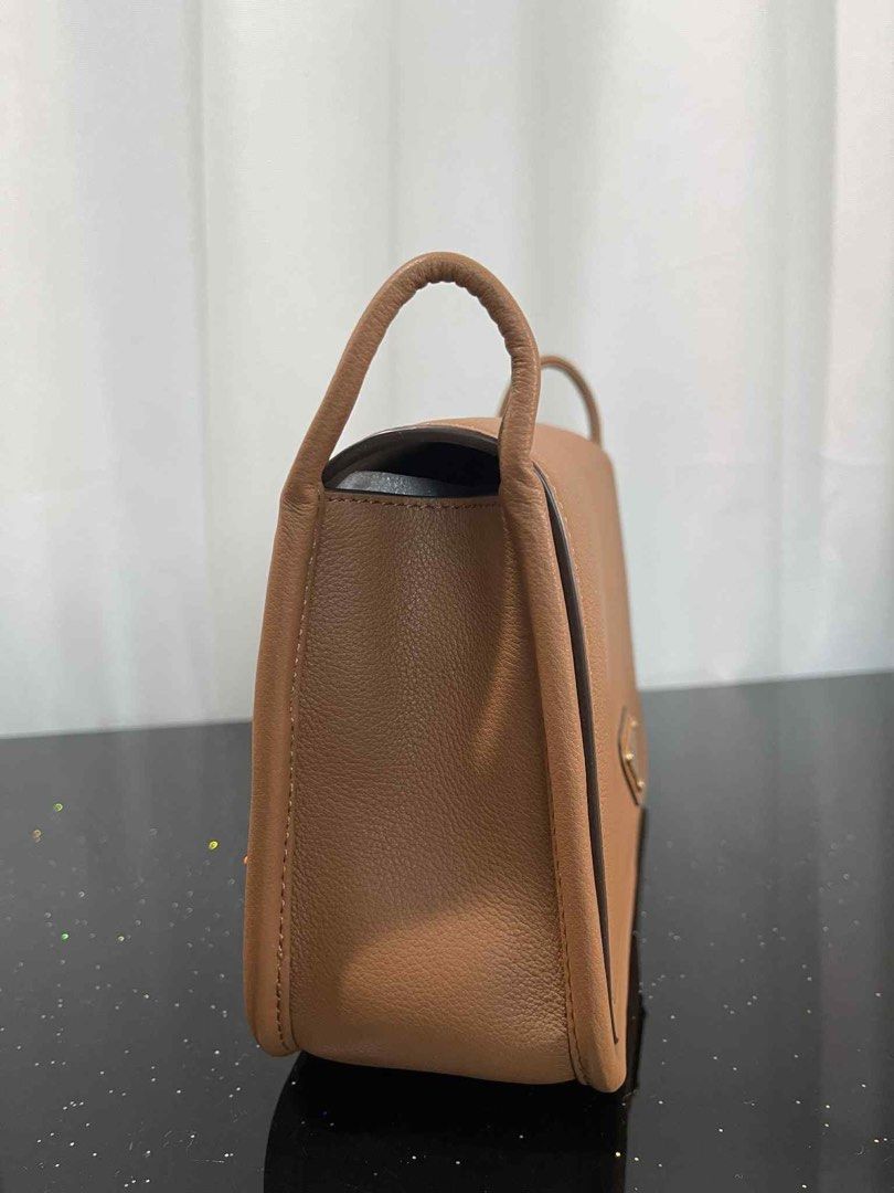 Prada leather sling (Category: Luxury Bags & Wallets) located in Quezon City. Submitted by rarebagsfrmjapan (Listing ID 1379707917, Image 3). Description: PERFECT GIFT OR GIVEAWAYS REWARD UR SELF OR LOVE ONES AT LEAST ONCE A YEAR !!! 𝐃𝐈𝐒𝐂𝐋𝐀𝐈𝐌𝐄𝐑: we are 𝐧𝐨𝐭 𝐚𝐬𝐬𝐨𝐜𝐢𝐚𝐭𝐞𝐝 𝐰𝐢𝐭𝐡 𝐭𝐡𝐞 𝐛𝐫𝐚𝐧𝐝𝐬 𝐭𝐡𝐚𝐭 𝐚𝐫𝐞 𝐥𝐢𝐧𝐤𝐞𝐝 𝐚𝐧𝐝 𝐬𝐭𝐚𝐭𝐞𝐝 𝐢𝐧 𝐭𝐡𝐢𝐬 𝐩𝐨𝐬𝐭. 𝐀𝐥𝐥 𝐫𝐢𝐠𝐡𝐭𝐬 𝐚𝐫𝐞 𝐫𝐞𝐬𝐞𝐫𝐯𝐞𝐝 𝐭𝐨 𝐢𝐭𝐬 �