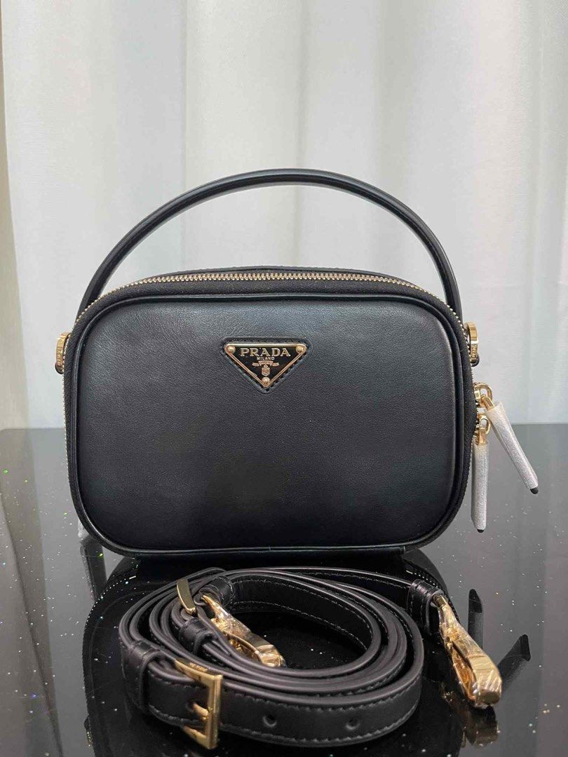 Prada Odette mini Leather sling (Category: Luxury Bags & Wallets) located in Quezon City. Submitted by rarebagsfrmjapan (Listing ID 1379707479, Image 1). Description: PERFECT GIFT OR GIVEAWAYS REWARD UR SELF OR LOVE ONES AT LEAST ONCE A YEAR !!! 𝐃𝐈𝐒𝐂𝐋𝐀𝐈𝐌𝐄𝐑: we are 𝐧𝐨𝐭 𝐚𝐬𝐬𝐨𝐜𝐢𝐚𝐭𝐞𝐝 𝐰𝐢𝐭𝐡 𝐭𝐡𝐞 𝐛𝐫𝐚𝐧𝐝𝐬 𝐭𝐡𝐚𝐭 𝐚𝐫𝐞 𝐥𝐢𝐧𝐤𝐞𝐝 𝐚𝐧𝐝 𝐬𝐭𝐚𝐭𝐞𝐝 𝐢𝐧 𝐭𝐡𝐢𝐬 𝐩𝐨𝐬𝐭. 𝐀𝐥𝐥 𝐫𝐢𝐠𝐡𝐭𝐬 𝐚𝐫𝐞 𝐫𝐞𝐬𝐞𝐫𝐯𝐞𝐝 �