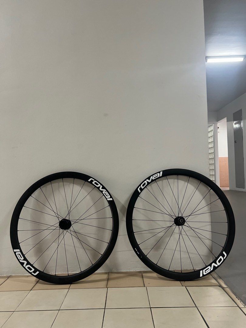 Roval Rapide C38 Wheelset (Category: Parts & Accessories) located in Singapore. Submitted by eating67 (Listing ID 1379645167, Image 1). Description: Roval Rapide C38 wheelset in excellent condition. Includes both front and rear wheels. The wheels are black with white Roval logos. They appear to be lightly used and well-maintained. Perfect for road bikes..