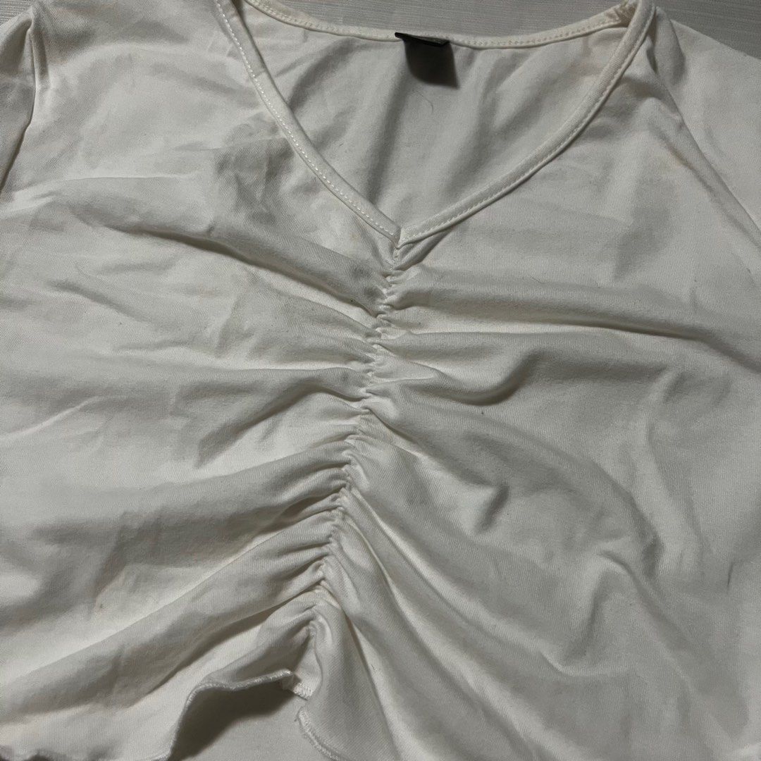 SHEIN White scrunched cropped top (Category: Shirts) located in Manila. Submitted by _fromrani (Listing ID 1379608729, Image 2). Description: - for xs-s - has tiny yellow stains due to storage (can be washed) - decluttering.