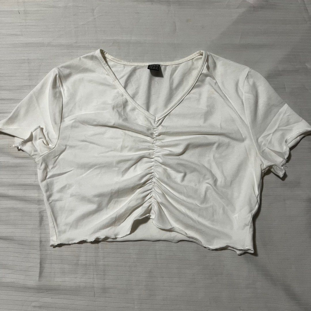 SHEIN White scrunched cropped top (Category: Shirts) located in Manila. Submitted by _fromrani (Listing ID 1379608729, Image 1). Description: - for xs-s - has tiny yellow stains due to storage (can be washed) - decluttering.