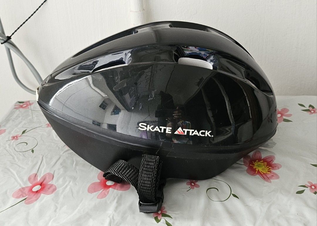 Skate Attack Helmet - Black (Category: Skates, Rollerblades & Scooters) located in Singapore. Submitted by bhappylah (Listing ID 1379696489, Image 1). Description: - Black Skate Attack helmet - Good condition with minimal wear - Adjustable straps - Interior padding for comfort and safety - Ideal for skateboarding and other recreational activities - Please refer to photos for details.