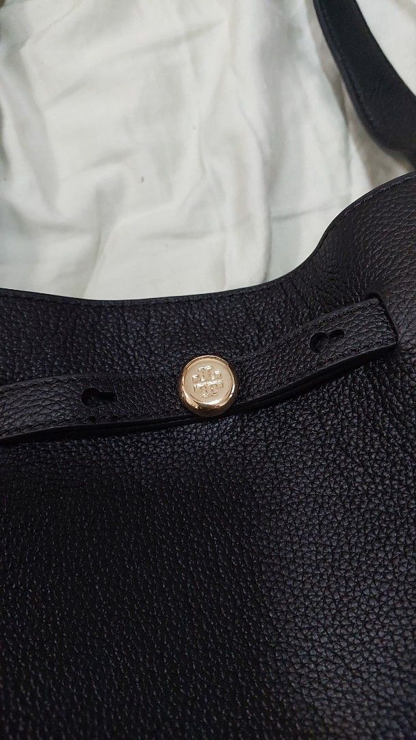 Tory Burch Black Romy Tote Bag (Category: Tote Bags) located in Singapore. Submitted by ambersun (Listing ID 1379652956, Image 2). Description: - Tory Burch Romy tote bag - Spacious interior/ Removable pouch with gold zipper - Magnetic closure - New with original tags and dust bag. No receipt. Very light weight!.