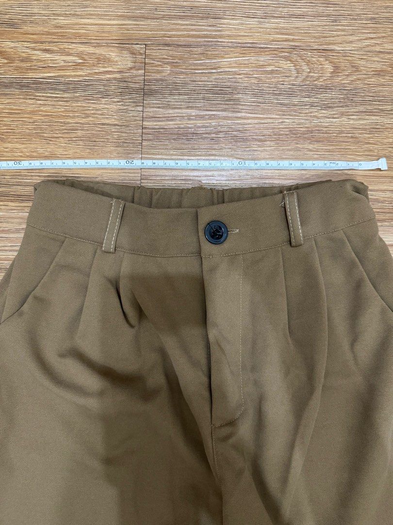 Trousers in Khaki Size S-M (Category: Other Bottoms) located in Mandaluyong City. Submitted by hanicart (Listing ID 1379623924, Image 2). Description: Size S-M garterized - never used rfs: decluttering.