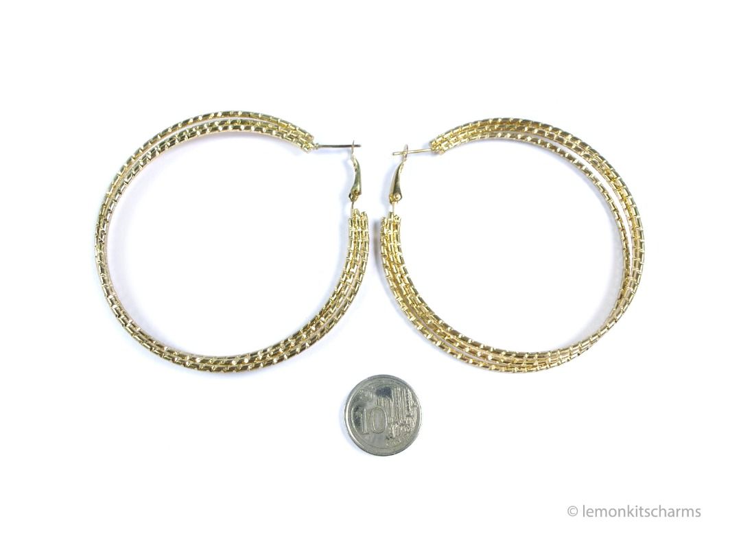 Vintage 1990s Triple Notched Hoop Pierced Earrings, er2686-ci (Category: Earrings) located in Singapore. Submitted by lemonkitscharms (Listing ID 1379695352, Image 2). Description: Vintage 1990s Triple Notched Hoop Earrings, for pierced ears. Good condition, slight darkening on goldtone from age. Goldtone, large hoops made of three wires with a notched texture. Suitable for thick earlobes as the distance between lever and posts is wide. Price exc