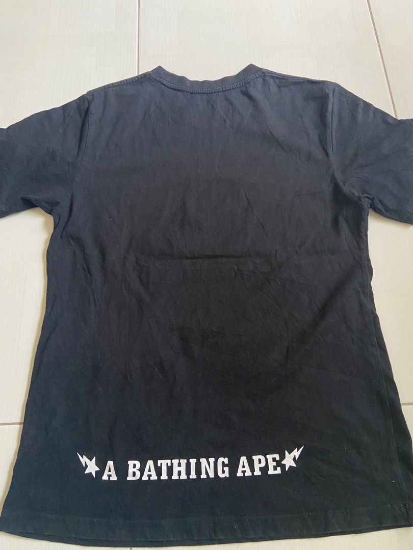 A Bathing Ape Black Tshirt (Category: Tshirts & Polo Shirts) located in Shah Alam. Submitted by rizqa_closet (Listing ID 1384088749, Image 2). Description: No size tag Pit 18.0’ Labuh 26.0’ Condition like new .