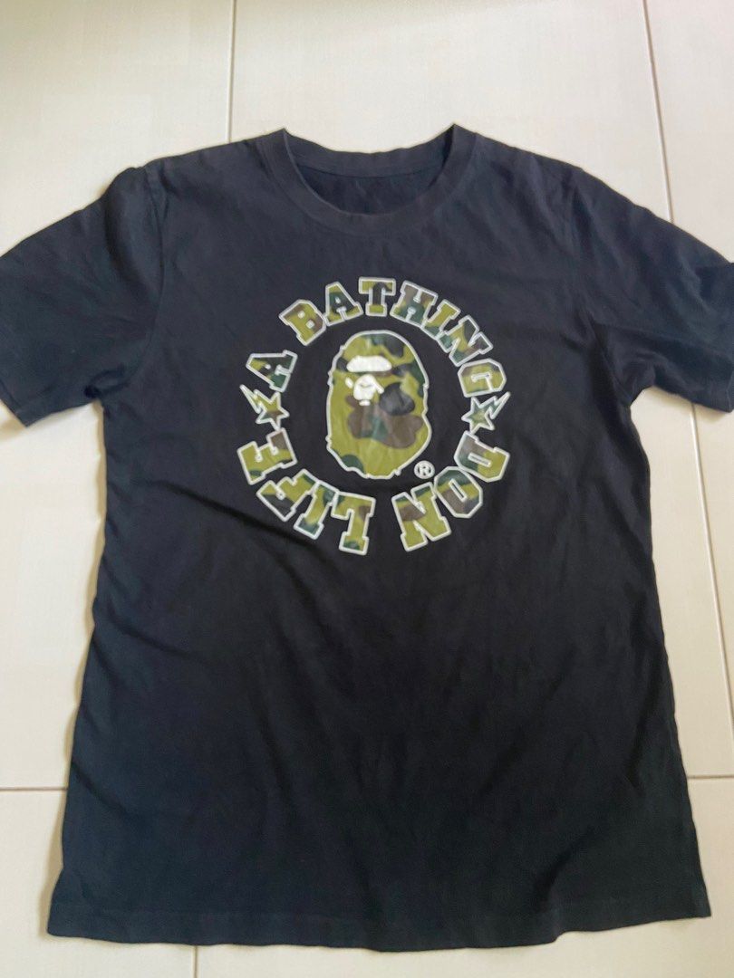 A Bathing Ape Black Tshirt (Category: Tshirts & Polo Shirts) located in Shah Alam. Submitted by rizqa_closet (Listing ID 1384088749, Image 1). Description: No size tag Pit 18.0’ Labuh 26.0’ Condition like new .