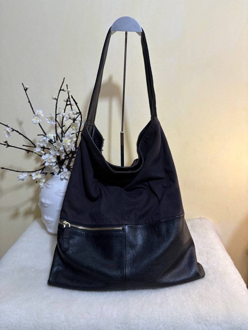 Authentic Hiroshima Black Genuine Leather Reversible Tote Bag (Category: Luxury Bags & Wallets) located in Binangonan. Submitted by makoleksyon (Listing ID 1384218579, Image 3). Description: Excellent condition Like new No flaws Bought in Japan 💯% Authentic Money back guarantee size H-18 x W-16.5.
