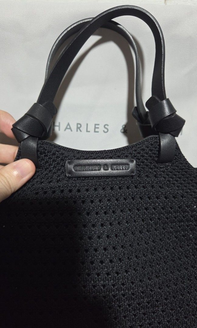 Charles & Keith Ida Knotted handle knitted bag (Category: Cross-body Bags) located in Valenzuela. Submitted by empot08 (Listing ID 1384171361, Image 3). Description: no issues, still in best condition with dust bag.