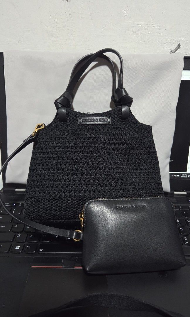 Charles & Keith Ida Knotted handle knitted bag (Category: Cross-body Bags) located in Valenzuela. Submitted by empot08 (Listing ID 1384171361, Image 2). Description: no issues, still in best condition with dust bag.