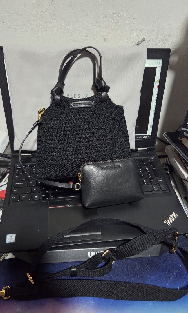 Charles & Keith Ida Knotted handle knitted bag (Category: Cross-body Bags) located in Valenzuela. Submitted by empot08 (Listing ID 1384171361, Image 1). Description: no issues, still in best condition with dust bag.