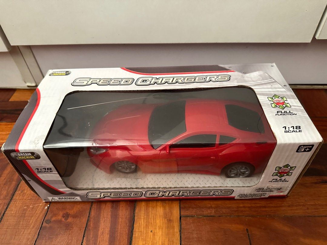 Dream Machine Speed Chargers RC Car (Category: Remote Control Toys) located in San Juan City. Submitted by gentleturtle.f9f7df (Listing ID 1384199566, Image 1). Description: Dream Machine Speed Chargers RC car. 1:18 scale. Brand new with box.