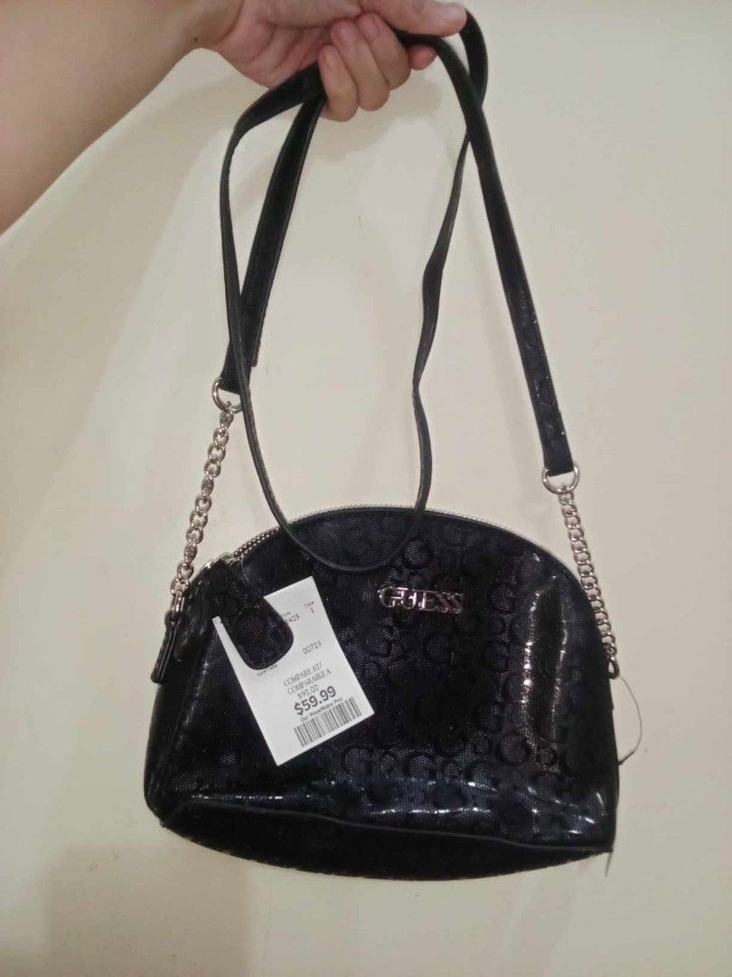Guess Monogram Embossed Crossbody Bag with chain Accented strap (Category: Cross-body Bags) located in Cainta. Submitted by orens123 (Listing ID 1384074403, Image 2). Description: Bought in canada Sobrang kinis. Walang box Super brand new Scratch proof Check all you want uppon meet up Never pa nagamit Rfs: Need money for medical reasons.
