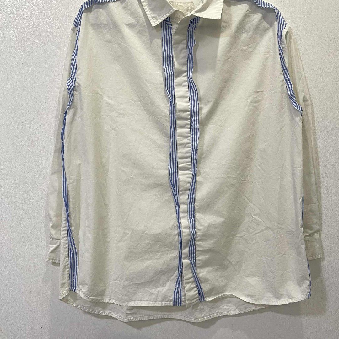 MAISON MARGIELA BUTTON UP SHIRT (Category: Luxury Apparel) located in Bacolod City. Submitted by the.finest (Listing ID 1384198698, Image 3). Description: Maison Margiela Stripe detail button up shirt Hidden button closure Width: 22 Length: 26.5 front - 27.5 back Condition: 9/10 1,500+shipping fee.