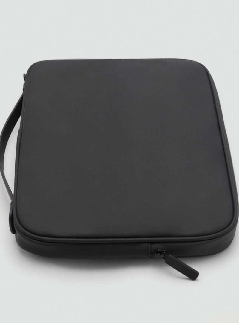 Mango Rubberized Laptop Case (Category: Laptop Bags & Sleeves) located in Calamba. Submitted by pence7799 (Listing ID 1384096293, Image 3). Description: Brand New Mango Rubberized Laptop Case. - Gummed Fabric. Short Handle. Main Compartment with Zip Closure. 4.0x23.0x33.0cm (L/H/W) First to pay only!.