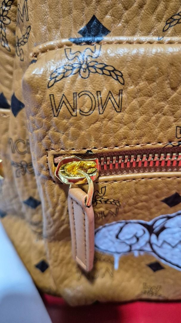 MCM Backpack (Category: Luxury Bags & Wallets) located in Imus. Submitted by tan_gerine389 (Listing ID 1384118655, Image 2). Description: MCM Backpack leather bag ⚘genuine soft leather ⚘LArge size ⚘without signs of usage ⚘Brown colour ⚘BAckpack bag ⚘Hardware is still very gold colour ⚘naikot turnilyo ⚘3500Pesos + sf ⚠️Please take time to read ⚠️Item is ukay source , please manage your expectations, if there is any, flaws and other signs of usage 