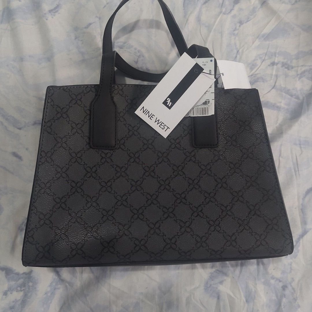 NINE WEST SHERYL JET BLACK LOGO (Category: Luxury Bags & Wallets) located in Iligan City. Submitted by assortedfinds143 (Listing ID 1384186670, Image 3). Description: -med size bag -simple yet elegant -guaranteed 100% ORIGINAL.