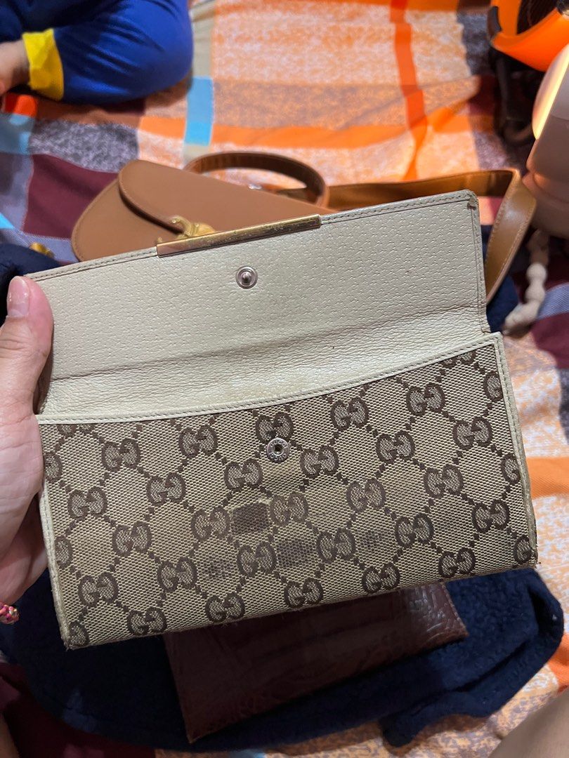 Original gucci long wallet (Category: Luxury Bags & Wallets) located in Santa Rosa. Submitted by qualityaunthenticbagsetc (Listing ID 1384158125, Image 2). Description: Rfs: declutter Project original gucci Wallet.