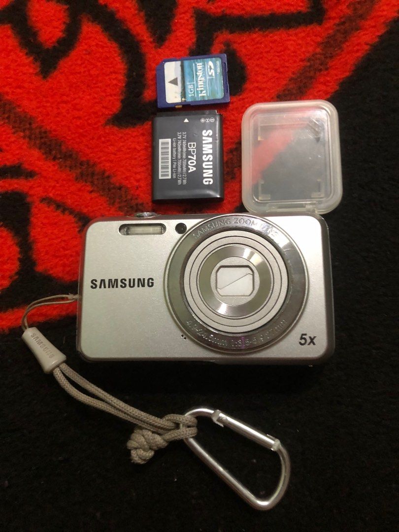 Samsung 12MP camera with issue (Category: Cameras) located in Quezon City. Submitted by markgolveo (Listing ID 1384210724, Image 2). Description: Samsung 12MP camera with issue it needs repairs For parts out repairs Issue is screen burn some white dirt dots on screen and flash does not seem to work but it did work before Battery easily depletes just for some seconds needs replacement Rest of All functionality works fine , buttons , menu features,