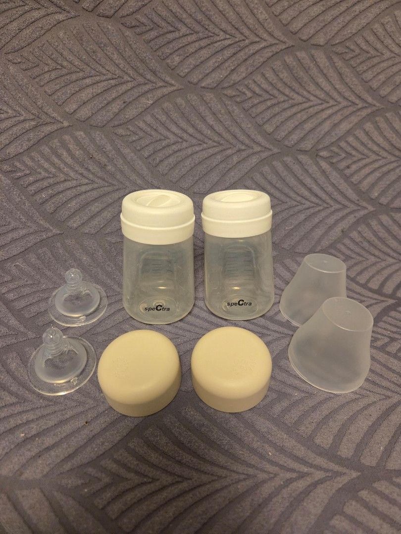 Spectra pump parts with Lacteck flange (Category: Breastfeeding & Bottle Feeding) located in Manila. Submitted by cglt2019 (Listing ID 1384065733, Image 1). Description: Spectra pump parts complete set with Lacteck flange Inclusions: 2 x Spectra bottles 2 x Spectra bottle cap 2 x Spectra bottle disc 2 x teats (generic, brandew) 2 x 17mm hard flange ( brandnew) 2 x back-flow protector (brandnew) 2 x silicone valves (brandnew) 2 x spectra wideneck 