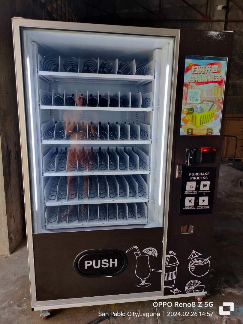 VENDING MACHINE HOT AND COLD (Category: Refrigerators and Freezers) located in La Paz. Submitted by iloilobranch2025 (Listing ID 1384108820, Image 3). Description: A vending machine is an automated machine that dispenses products, typically food and drinks, after payment is inserted. It allows for self-service purchases without direct human interaction. Vending machines can be found in various locations, including schools, offices, and public spa
