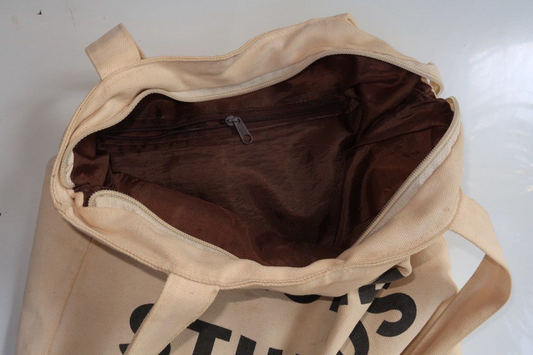 Acne Studios Tote Bag (Category: Tote Bags) located in Manila. Submitted by talisman_lei (Listing ID 1385981947, Image 2). Description: Lightly used Acne Studios Tote bag, perfect for your daily essentials, has 1 separate compartment on the inside and 1 more outside and main zipper at the top to clearly protect your belongings, this tote bag is perfect for you!.