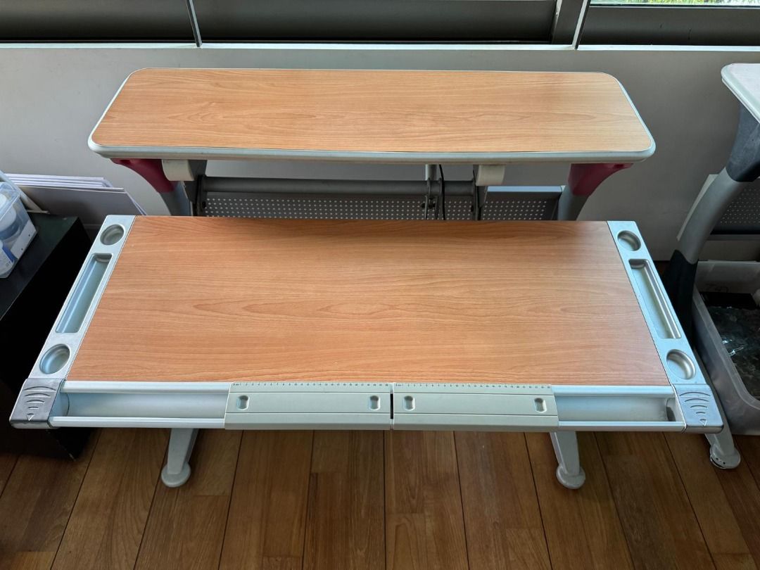 Adjustable Study Table (Category: Tables & Sets) located in Singapore. Submitted by nic.oleeeee (Listing ID 1385843192, Image 1). Description: - Great condition - Features a wooden tabletop - Adjustable height settings (55cm-75cm) - Suitable for kids and adults - Perfect for studying or working from home - Length 113cm, Depth 83cm.